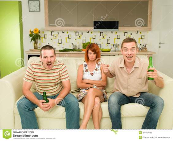 friends-watching-exciting-game-two-men-sitting-couch-television-kitchen-holding-beers-screaming-upset-women-44455038